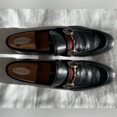 Vintage Gucci “Playboy” loafers in black watersnake exotic skin.